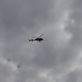 The helicopter's filming the action.