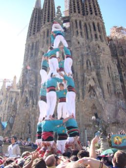 Castellers, or a human tower, in front of La Sagrada Familia (Wikimedia Commons)