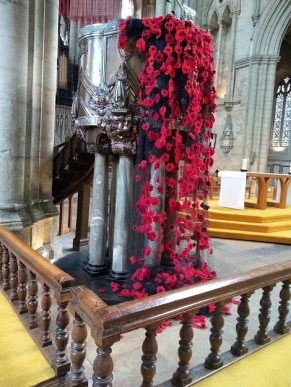 Poppies cascade from the pulpit in the Cathedral.