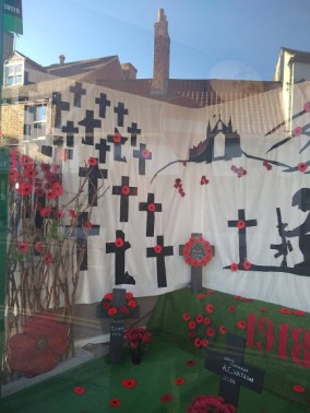 A window display in Calvert's Carpets, naming some of the fallen.